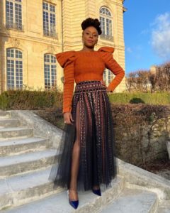 The Queen decided to serve us some legs in this Aso-Oke themed top and classy Dior skirt