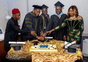Umeh brothers cutting cake with parents