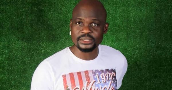 A man, Nollywood actor Baba Ijesha, with mouth half-opened